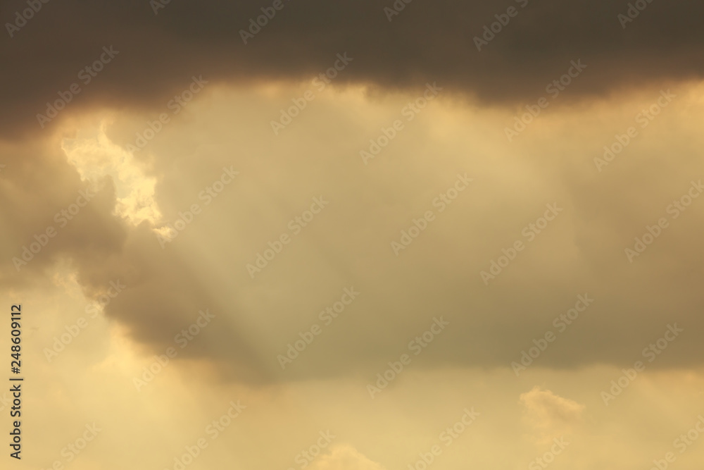 sunlight through cloud on dramatic sky after the rain