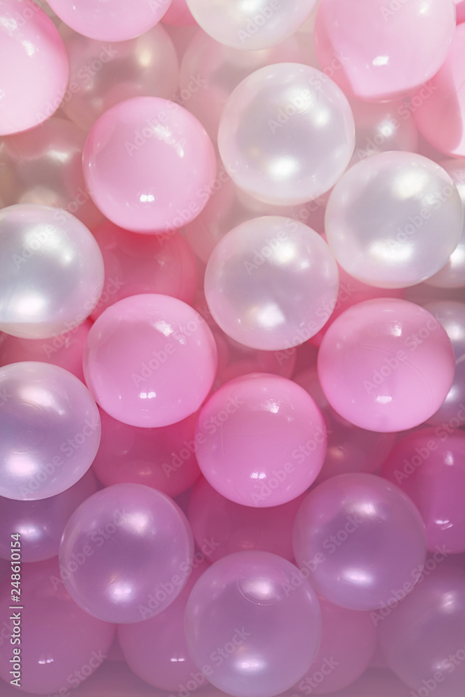 Pink and white balls, pastel pink bubbles for beautiful birthday texture background. Top view, flat lay