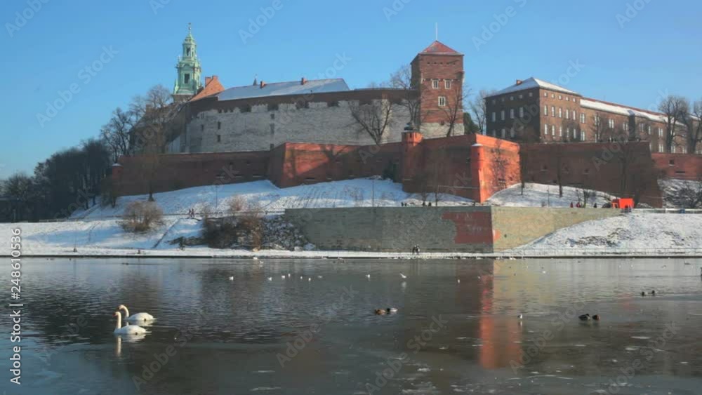 View of the Wawel castle and the Vistula River in Krakow in winter day View of the Wawel castle and the Vistula River in Krakow in winter day