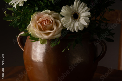 Obraz na płótnie bouquet of flowers, on old coffee-table in old ceramic vase w salonie