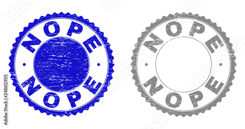 Grunge NOPE stamp seals isolated on a white background. Rosette seals with grunge texture in blue and gray colors. Vector rubber stamp imprint of NOPE label inside round rosette.
