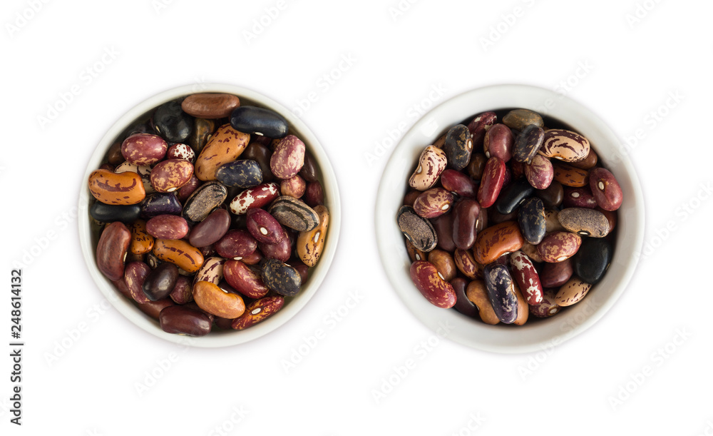 Kidney beans isolated on white background. Top view. Kidney beans in a wooden bowl isolated on white background. Kidney beans with copy space for text. Kidney beans isolated on white background. Top view. Kidney beans in a wooden bowl isolated on white background. Kidney beans with copy space for text.