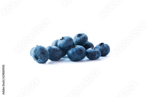 Heap of blueberry fruits isolated on white background. Ripe blueberries with copy space for text. Blueberries on a white background.