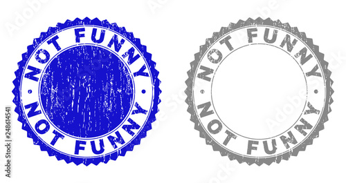 Grunge NOT FUNNY stamp seals isolated on a white background. Rosette seals with grunge texture in blue and grey colors. Vector rubber stamp imitation of NOT FUNNY title inside round rosette.