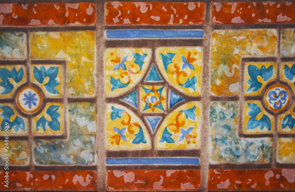 ODetail of the traditional tiles from facade of old house. Decorative tiles.Valencian traditional tiles. Floral ornament.