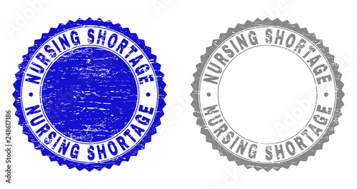 Grunge NURSING SHORTAGE stamp seals isolated on a white background. Rosette seals with grunge texture in blue and gray colors.