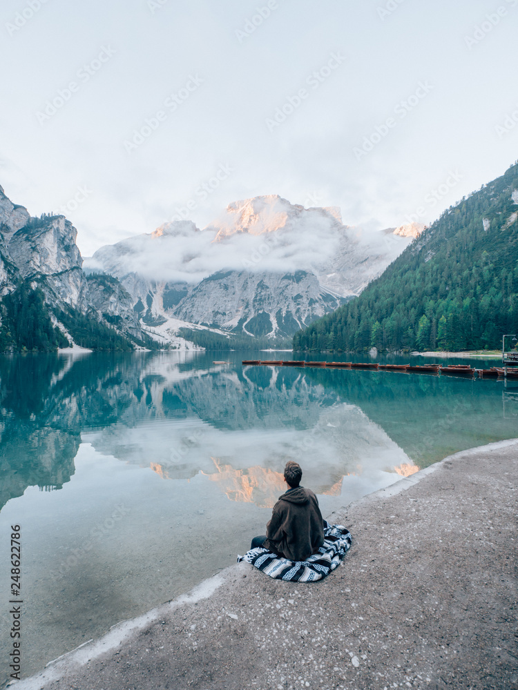 Tourists in front of the Lago di Braies in the Dolomites Tourists in front of the Lago di Braies in the Dolomites