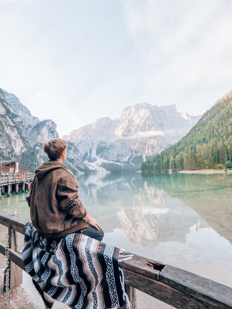 Tourists in front of the Lago di Braies in the Dolomites
