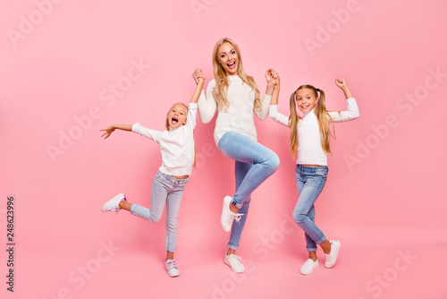 Full length size body portrait of nice cute attractive charming cheerful cheery kind people mom mum mommy holding hands spending free time isolated over pink pastel background