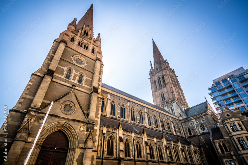 Fototapeta premium Side view of St Paul's Cathedral an Anglican Gothic Revival church in Melbourne Vic Australia