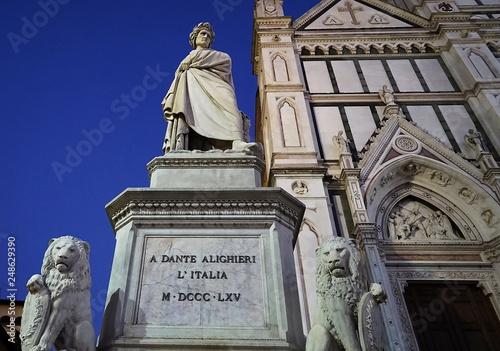 Statue of Dante Alighieri, in Santa Croce square, Florence, Italy photo