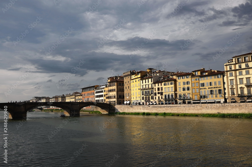 The Arno River in Florence on a cloudy day, Italy