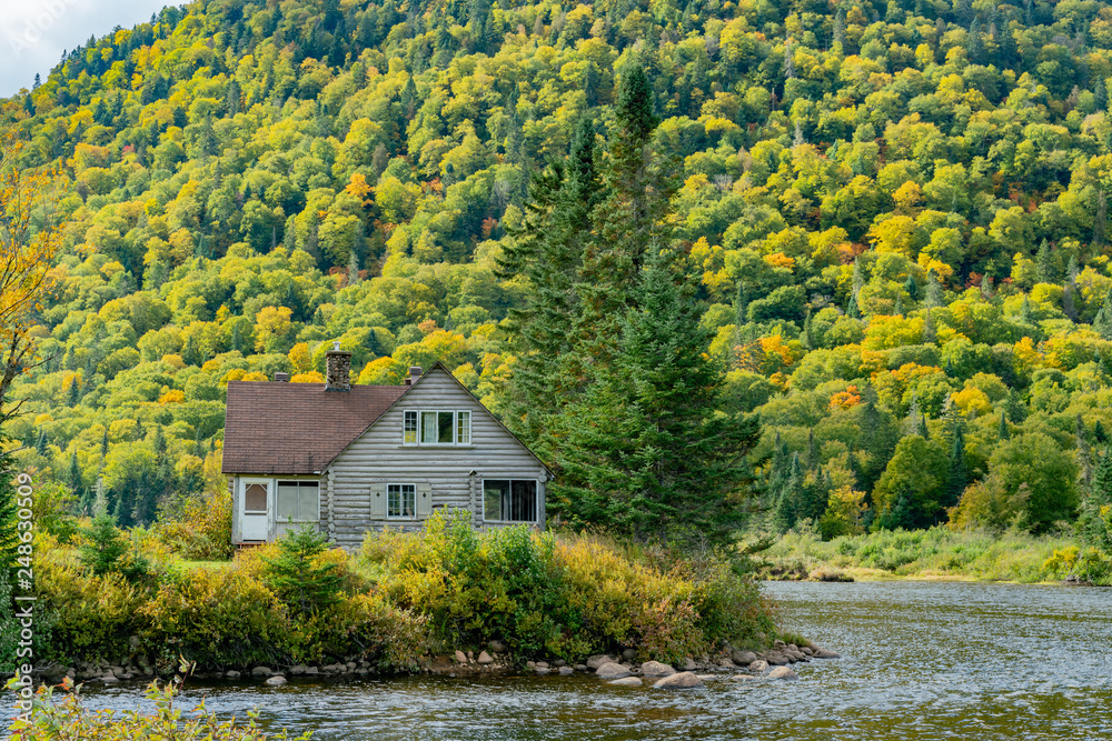 Beautiful fall color with a house of Jacques-Cartier National Park