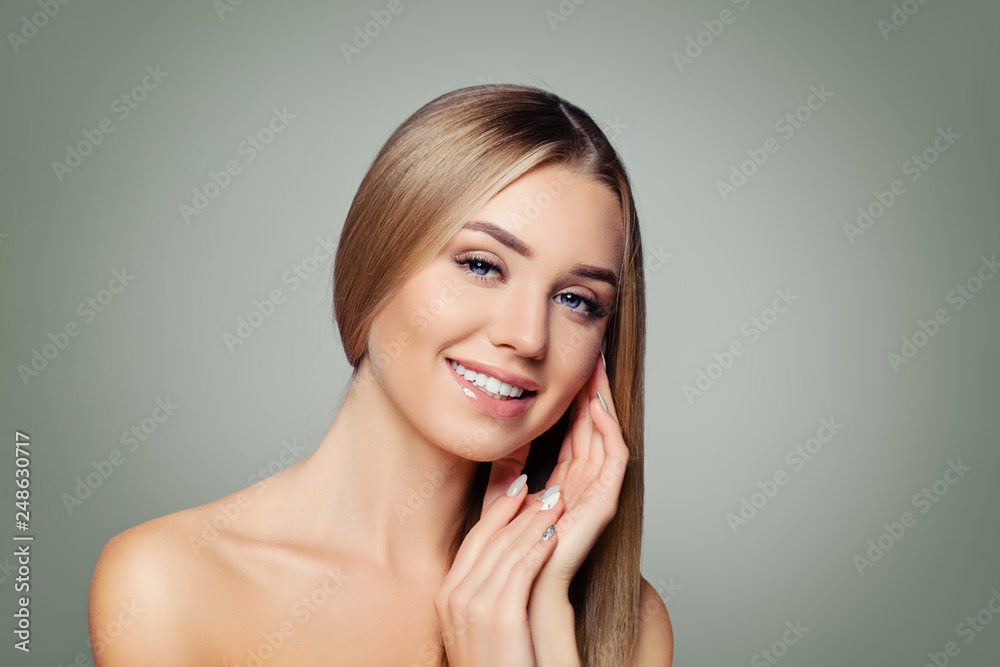 Beautiful smiling woman portrait. Perfect female model face Beautiful smiling woman portrait. Perfect female model face