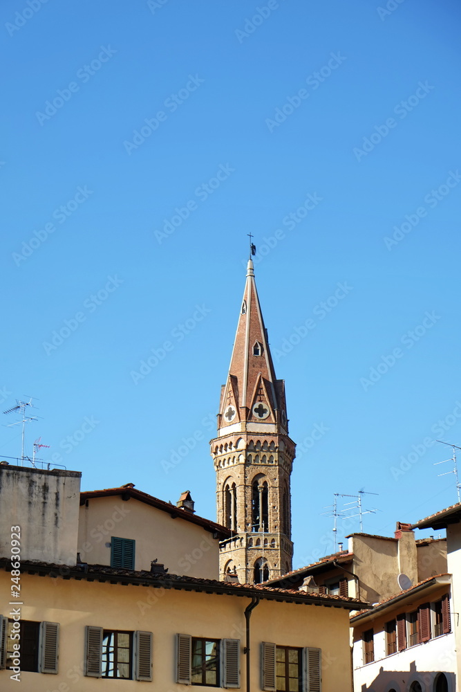 View of bell tower of Badia Fiorentina from Signoria square, Florence, Italy