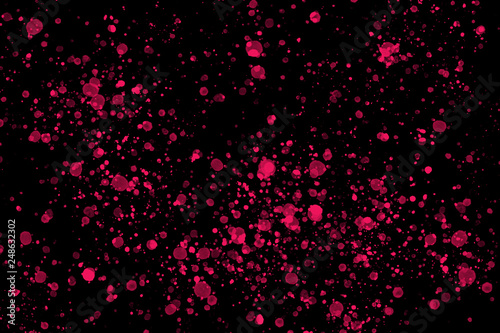Bright red paint splashes on black background Color splash and drop pattern Abstract texture for web-design, digital printing or concept design.
