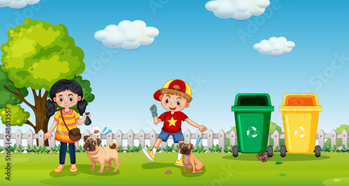 Kids walking dog at the park