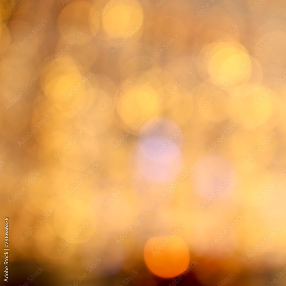 Golden bokeh lights as abstract background