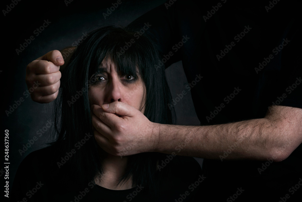Stop Violence, Scared woman victim of domestic violence Stop Violence, Scared woman victim of domestic violence