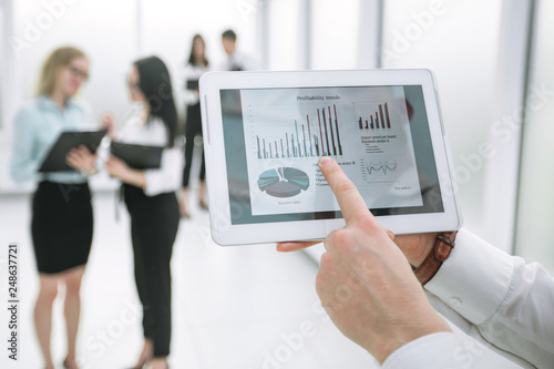 close up. businessman touching the screen of digital tablet.