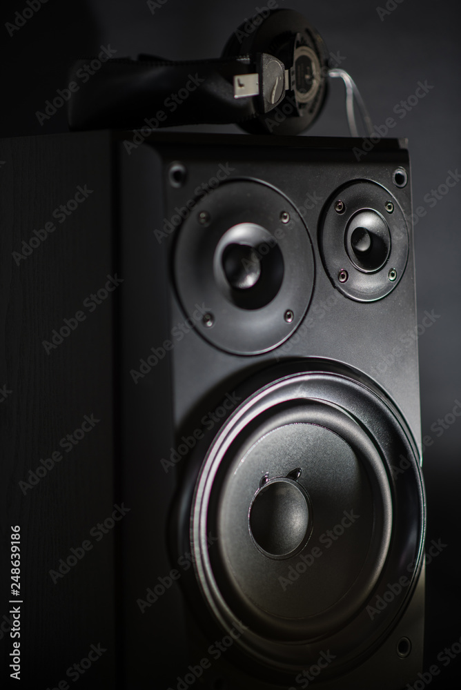 Audio speaker and headphones on top Audio speaker and headphones on top