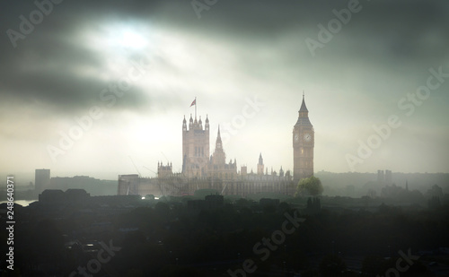 Big Ben and Houses of Parliament at dark misty day. London  UK