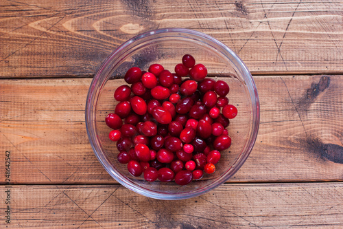 Step by step preparation of cranberry juice, step 1 - preparation of ingredients, top view, selective focus photo