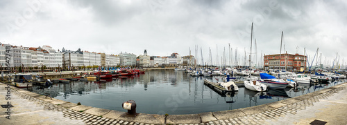 Port marina and buildings in center of Coruna Spain. photo
