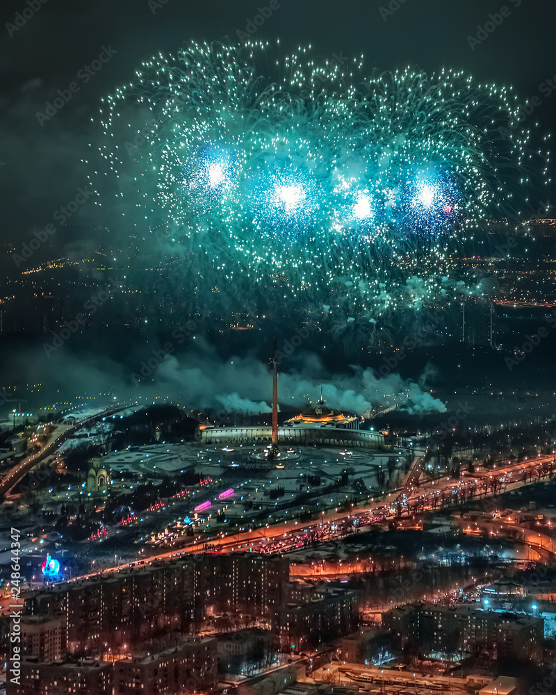 green firework over the moscow victory park roof top view