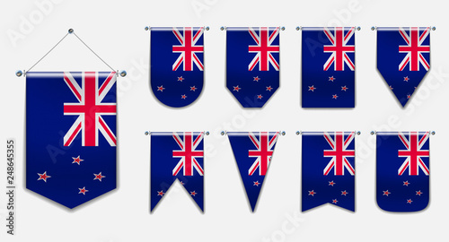 Set of hanging flags of the NEW ZEARLAND with textile texture. Diversity vertical isolated 3D shapes of the national flag of country.Vertical Template pennant for background, banner, award, festival