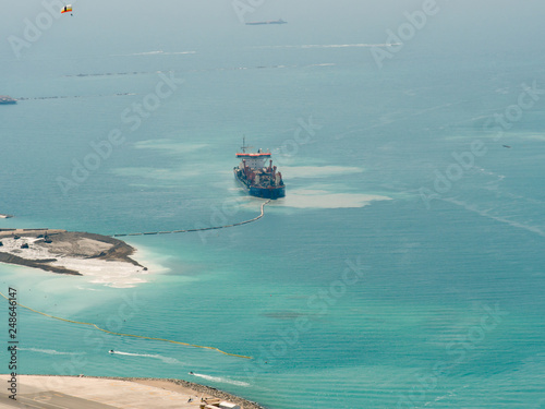 Dredging ship creating new island in Dubai photo