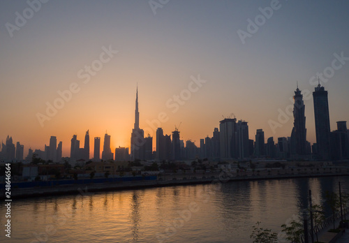 Panorama of the city of Dubai early in the morning at sunrise with a bridge over the city channel Dubai Greek.