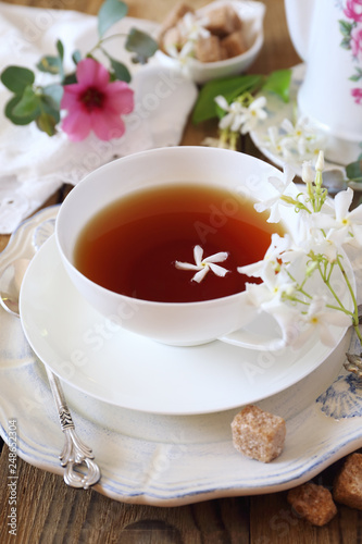 Vintage style: romantic tea drinking with jasmine tea