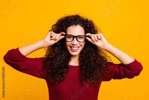 Close-up portrait of her she nice cute attractive lovely cheerful cheery positive wavy-haired lady college tutor teacher touching glasses laser correction isolated over bright vivid shine background