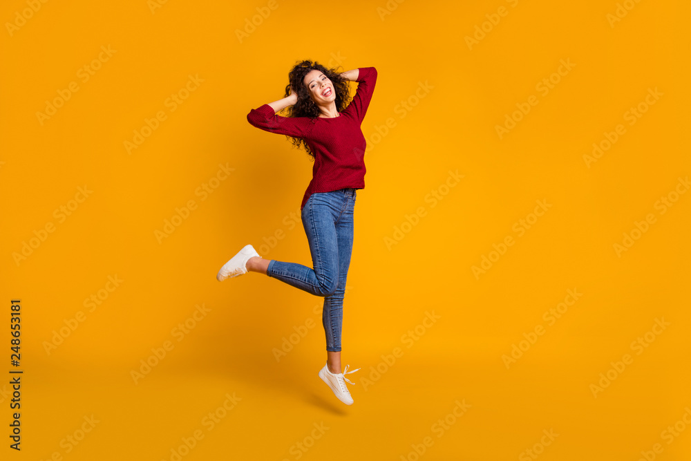 Full length body size view of her she nice lovely attractive cheerful cheery careless slim thin fit wavy-haired lady rejoice good sunny day isolated on bright vivid shine orange background