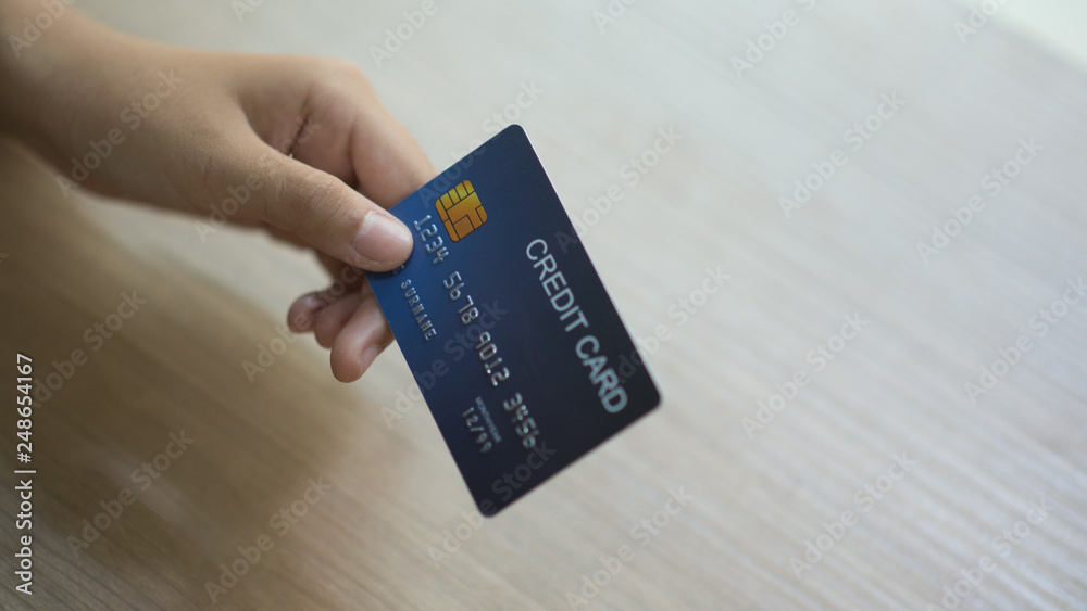 Using a credit card on hand, Banner for web - Image Using a credit card on hand, Banner for web - Image
