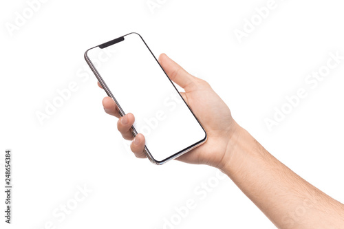 Male hand holding smartphone with blank screen