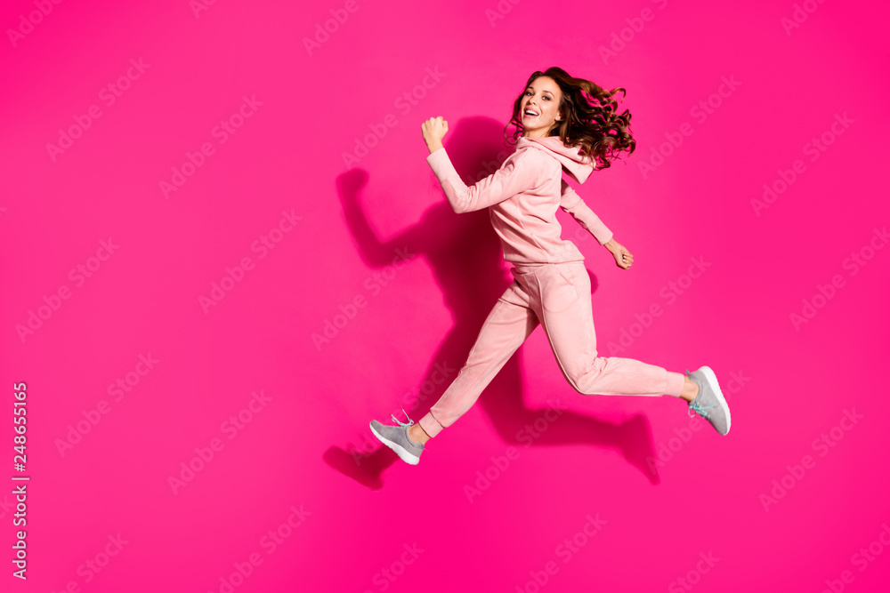 Full length body size photo flight high amazing she her lady hands arms help rush shopping wide steps funny funky wearing casual pink costume suit pullover outfit isolated vibrant rose background