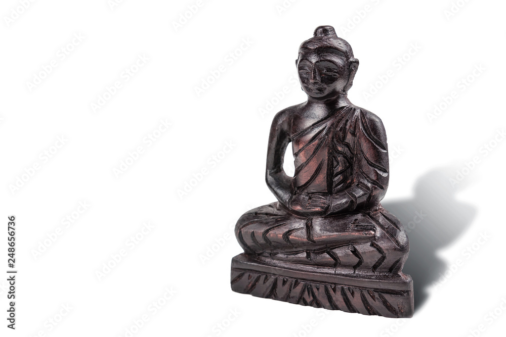 Wooden statue of Buddha on white Wooden statue of Buddha on white