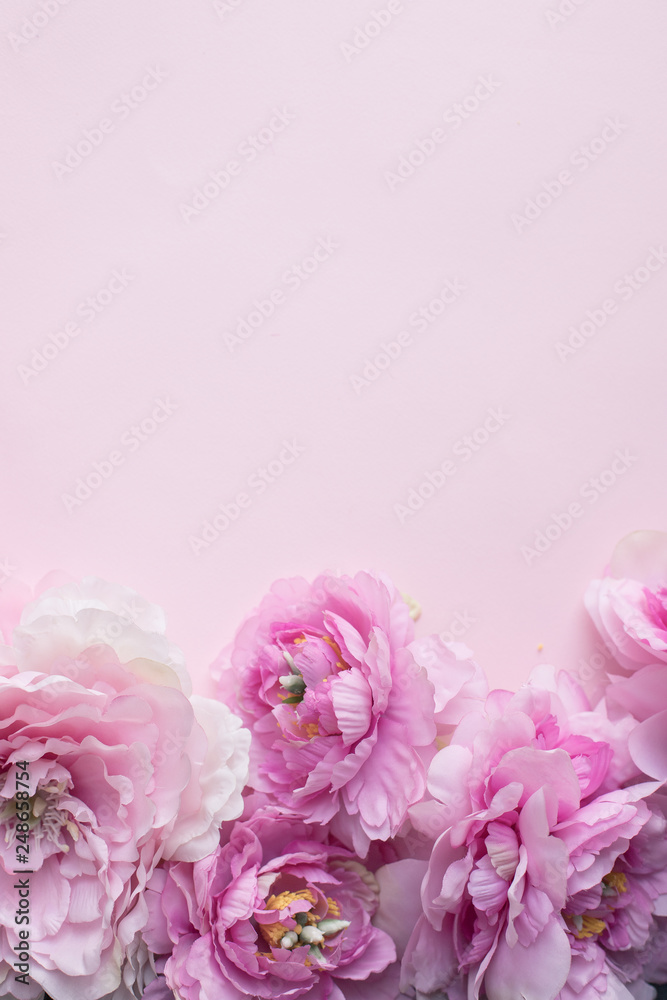 Woman's Day greeting card background with pink peonies flowers.