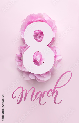 8 march hand lettering and peonies flowers. Woman's Day greeting card background.