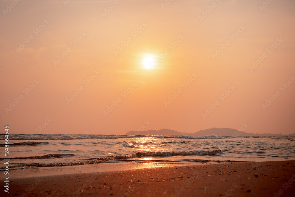 Fototapeta premium Beautiful cloudscape over the sea, The people are on the beach