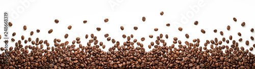Fotografiet Panoramic coffee beans border isolated on white background with copy space