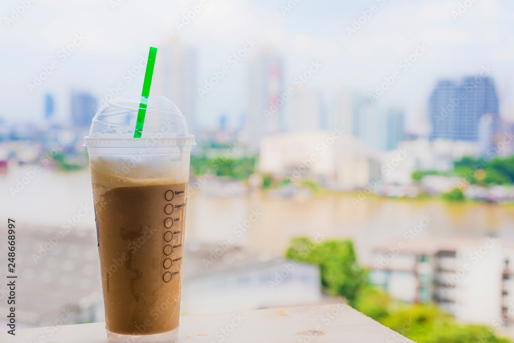 Ice coffee with river view and city view Ice coffee with river view and city view