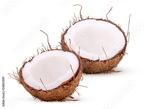 Two freshly coconut in shell cut in half