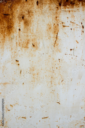 iron sheet in white paint with rusty spots