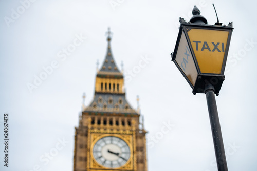 Street lamp with taxi stop in London