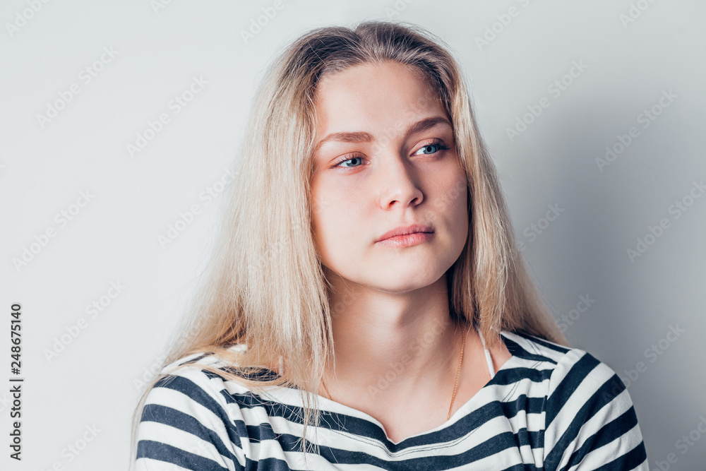 young beautiful sad woman serious and concerned looking young beautiful sad woman serious and concerned looking