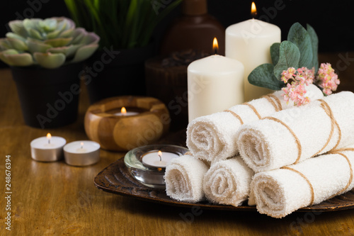 Spa still life with aromatic candles  flower and towel. - Image.