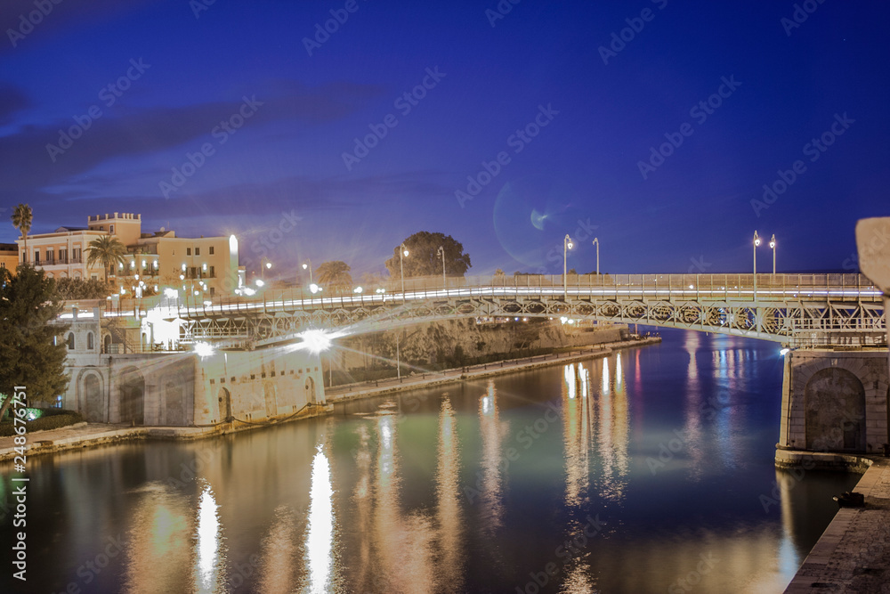A beautiful shot of the city of Taranto in south Italy by the main focus areas of the city at late sunset